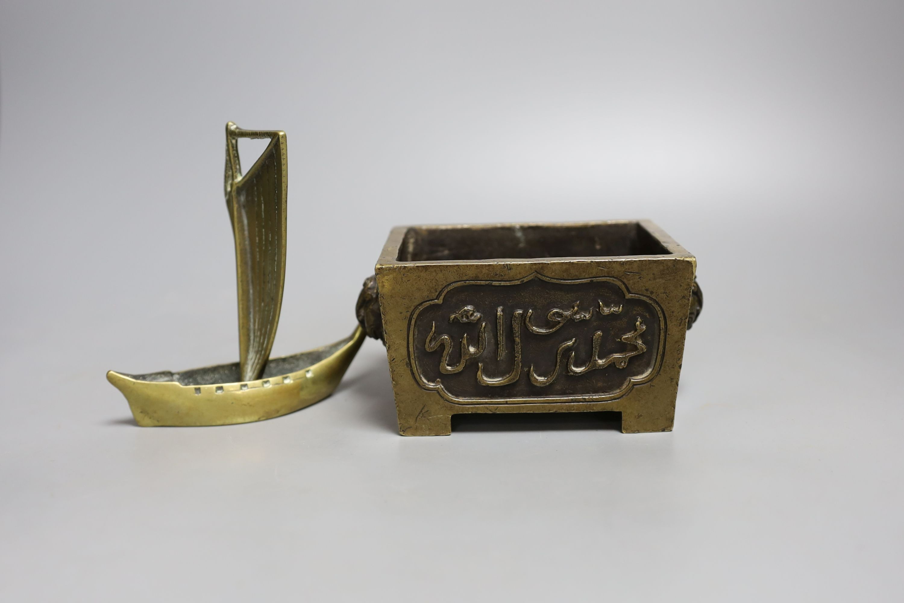 A Chinese bronze censer and a bronze boat